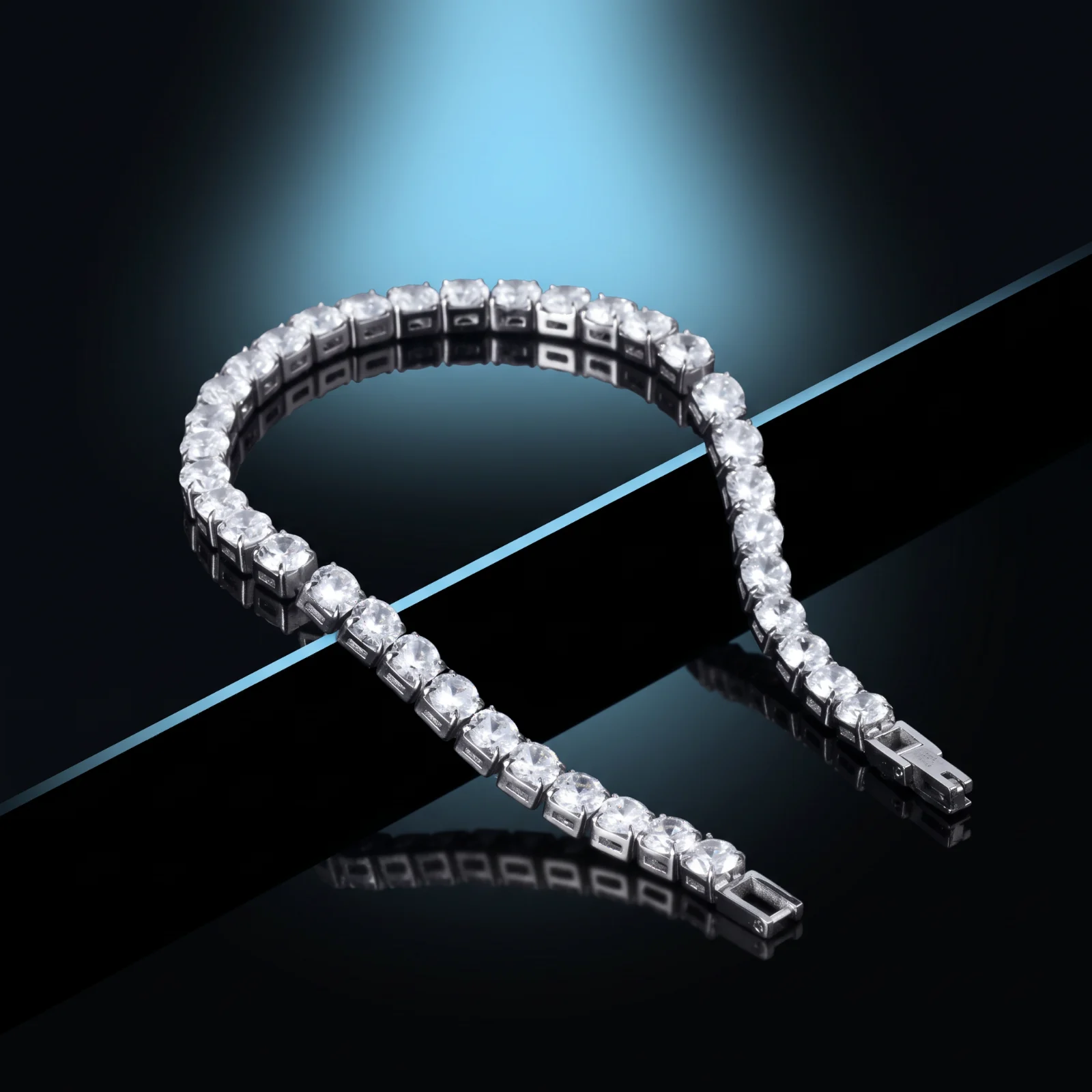 FLEXXERA tennis bracelet opened, showing the box clasp with safety lock